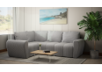 Komfortowa sofa narożna BUENO II z funkcją spania, tapicerowana w niebieskim kolorze, schowek pod siedziskiem